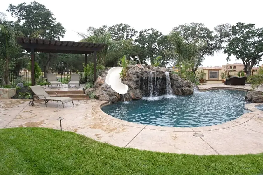 Pool Slide in Backyard Pool